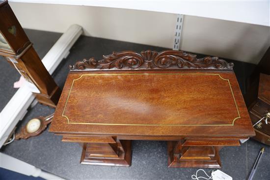 An early Victorian mahogany novelty tea caddy in the form of a twin pedestal sideboard, 15.75in. height 11in.